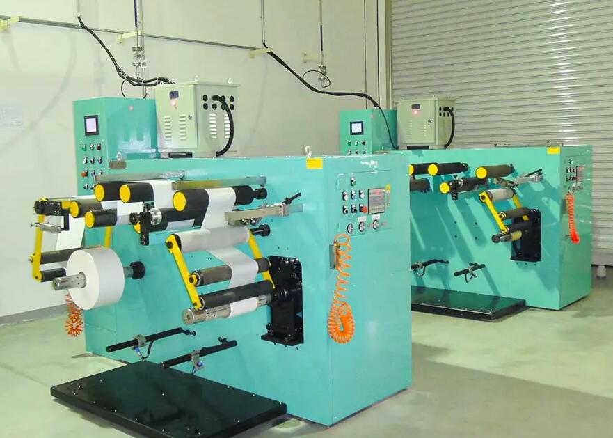 How does the core material and diameter in a slitter rewinder affect the winding process and the stability of the finished rolls?